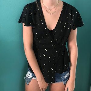 Sheer black tie-front top with gold stars